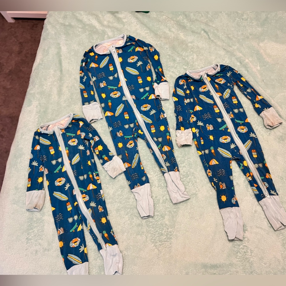 A set of Pool Party, little sleepies zippy’s!